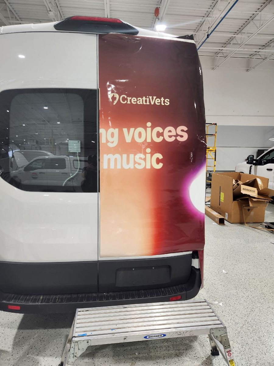 Rear quarter wrapped to carry the design around the corner