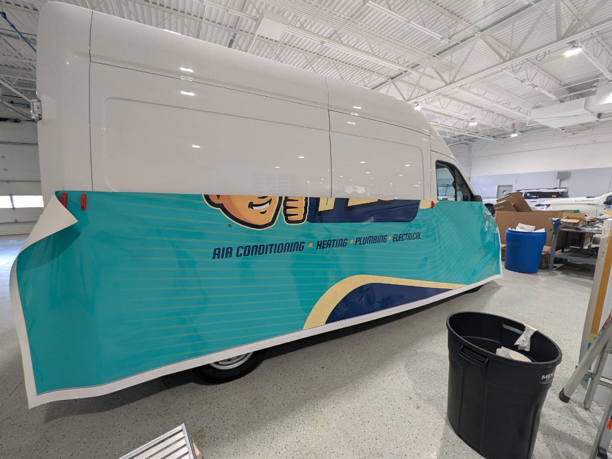Box van — wrap panels going on section by section